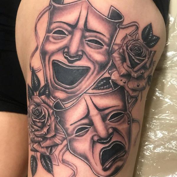 Laugh Now Cry Later with roses thigh tattoo