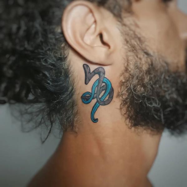 Leo and Capricorn neck tattoo