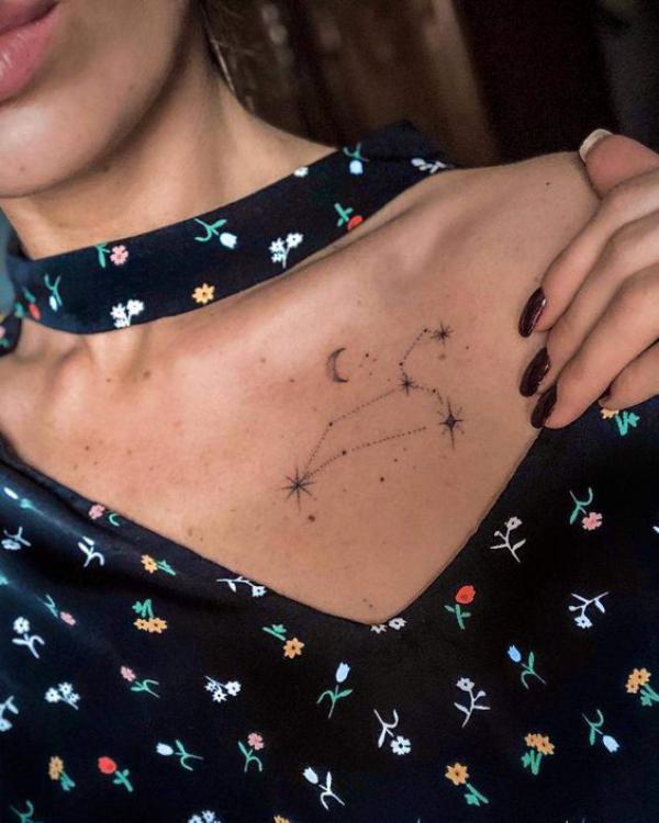 Leo constellation with moon and stars tattoo
