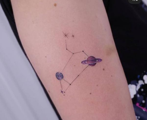 Leo constellation with planets tattoo