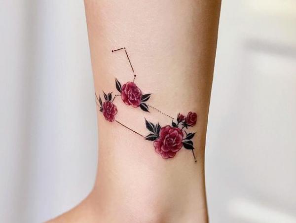 Leo constellation with roses tattoo