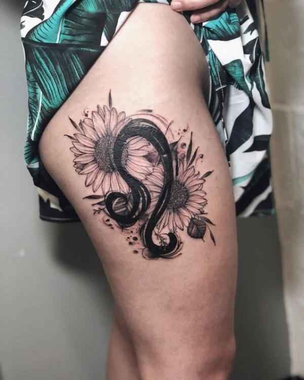 Leo glyph and sunflower thigh tattoo