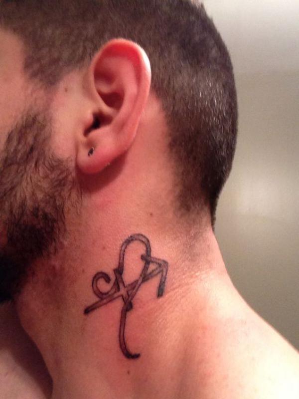 Leo glyph neck tattoo