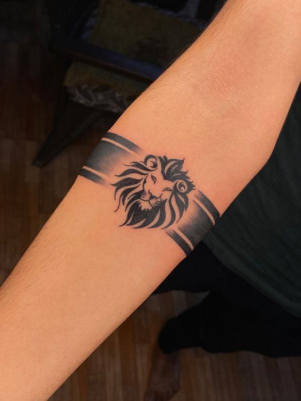 Lion Tattoo | Lion tattoo, Band tattoo designs, Forearm band tattoos