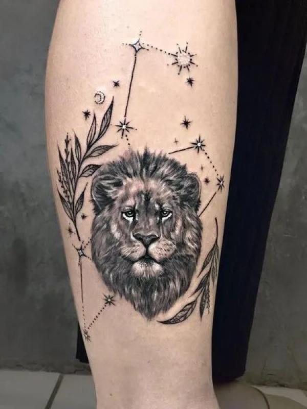 Leo lion with constellation arm tattoo