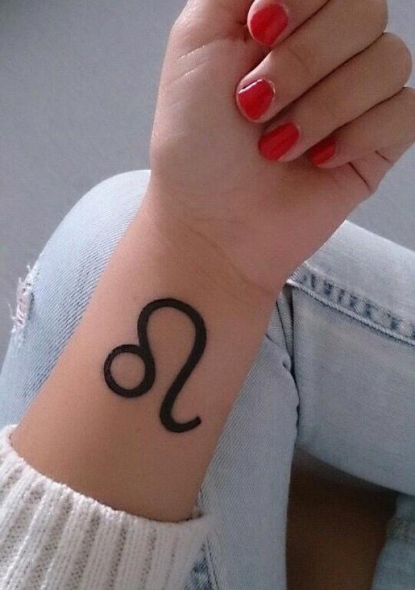 Leo sign wrist tattoo