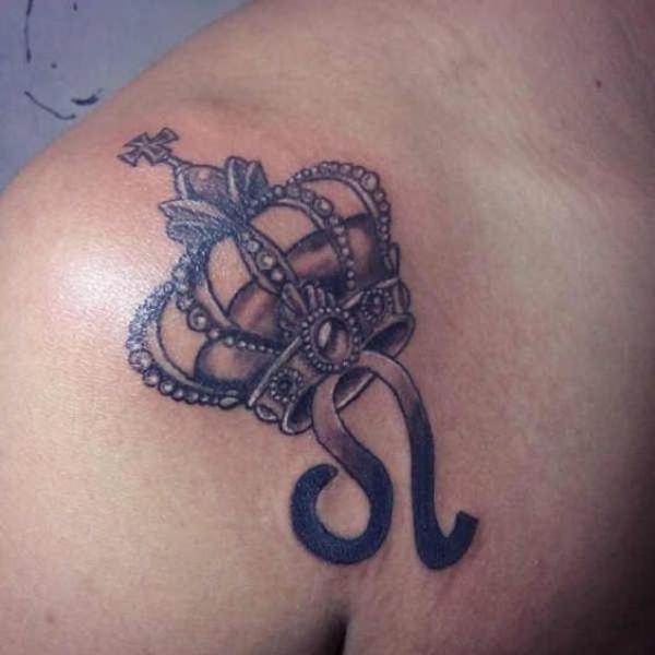 Leo with crown shoulder tattoo