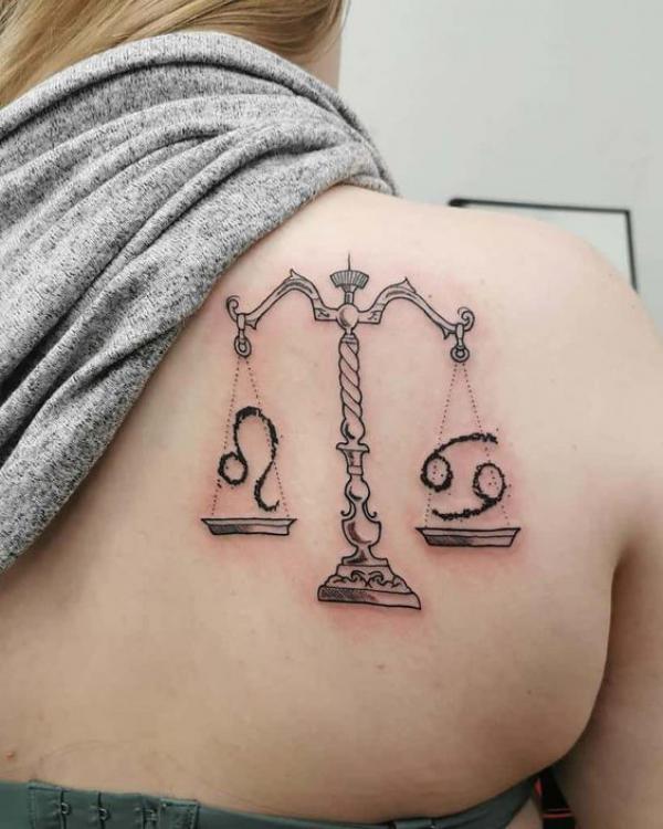 Libra scales with Leo and cancer tattoo