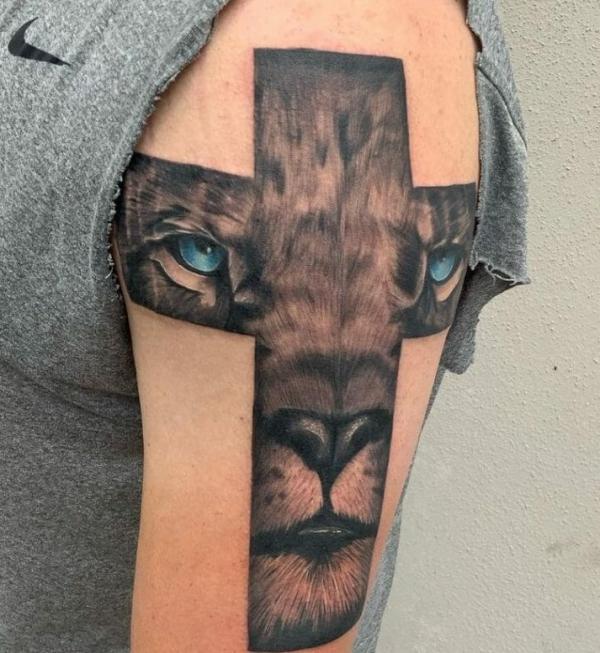 Lion face cross half sleeve tattoo