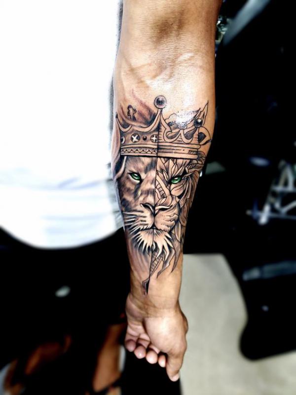 Lion king forearm tattoo