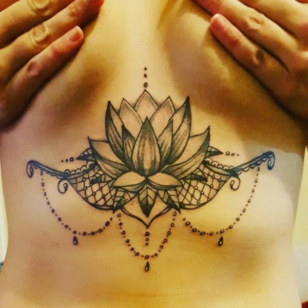 Lotus with lace and pendant stomach tattoo