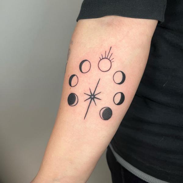 Lunar cycle with star tattoo