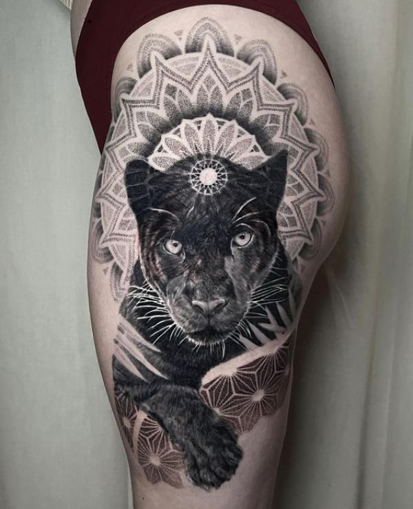 Mandala and black panther thigh tattoo