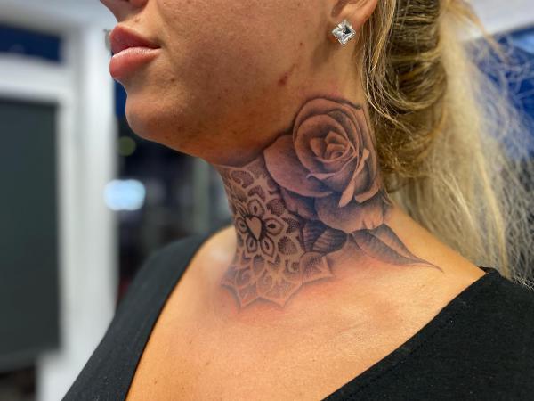 Mandala and rose neck tattoo