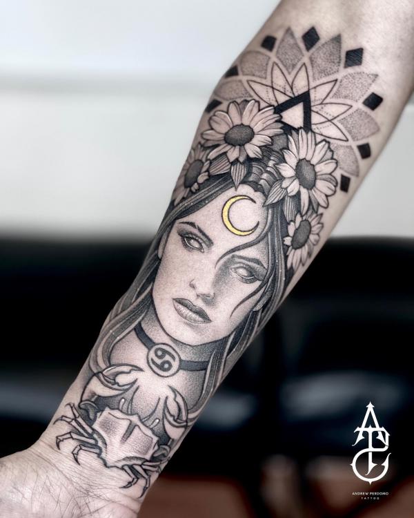 Mandala flower woman with Zodiac cancer crab and glyph forearm tattoo