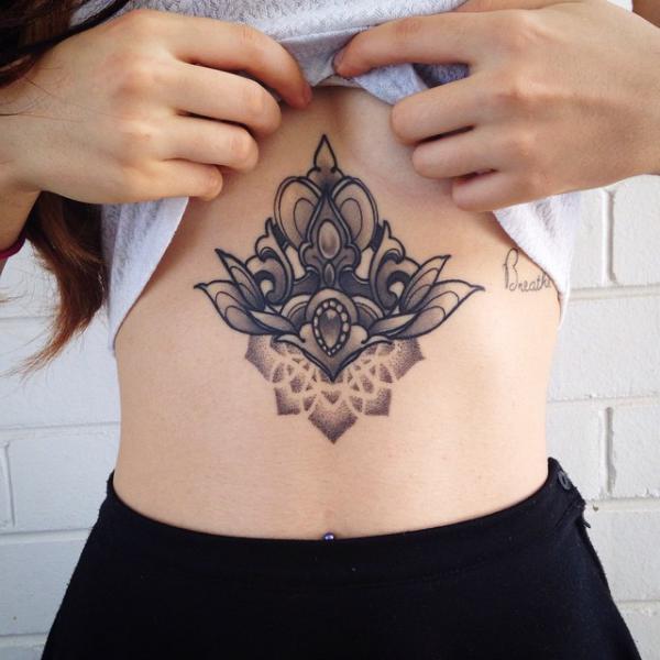Mandala stomach tattoo for women