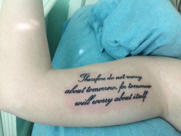 Matthew 6 34 bicep tattoo
