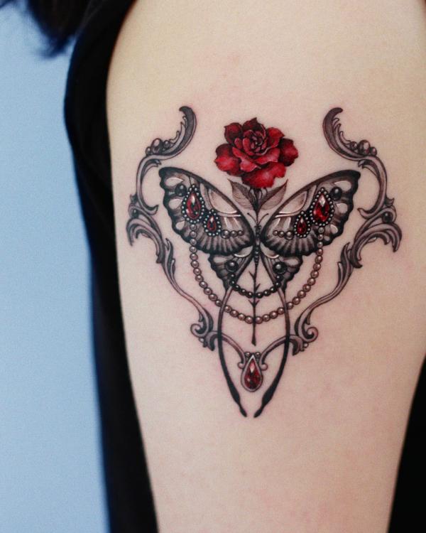 Metallic luna moth jewelry tattoo