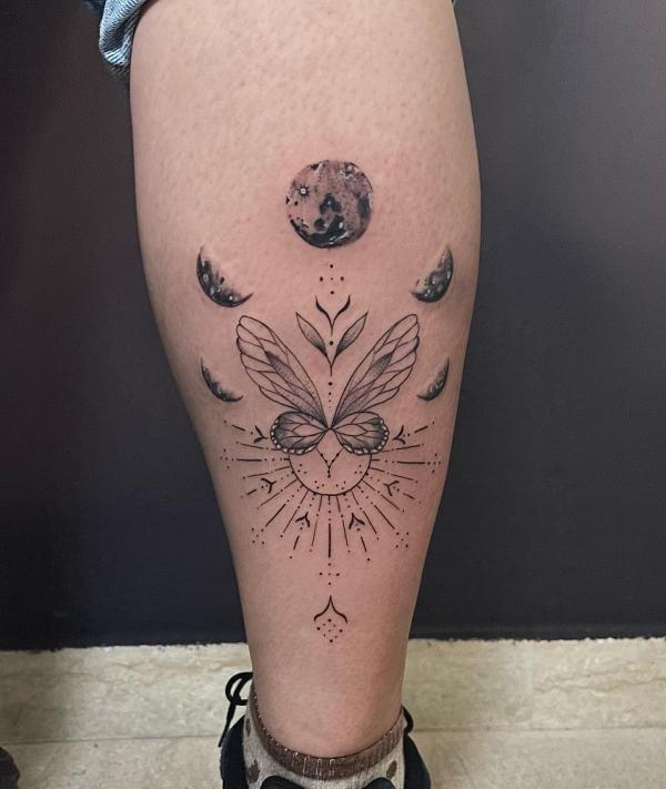 Moon phases and butterfly calf tattoo