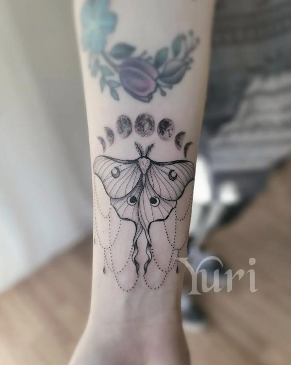Moon phases and lunar moth tattoo