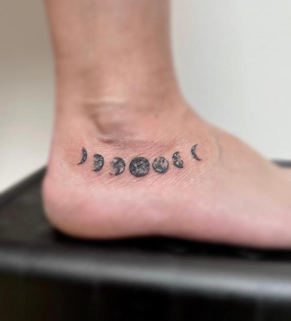 Moon phases ankle tattoo