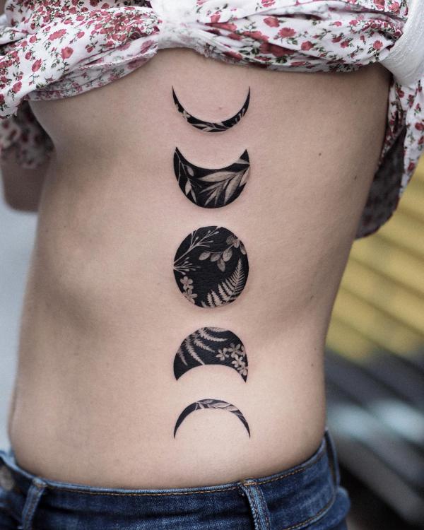 Moon phases rib tattoo
