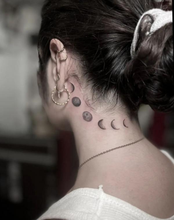Moon phases side neck tattoo