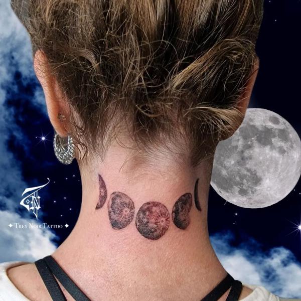 Moon phases tattoo on back of neck