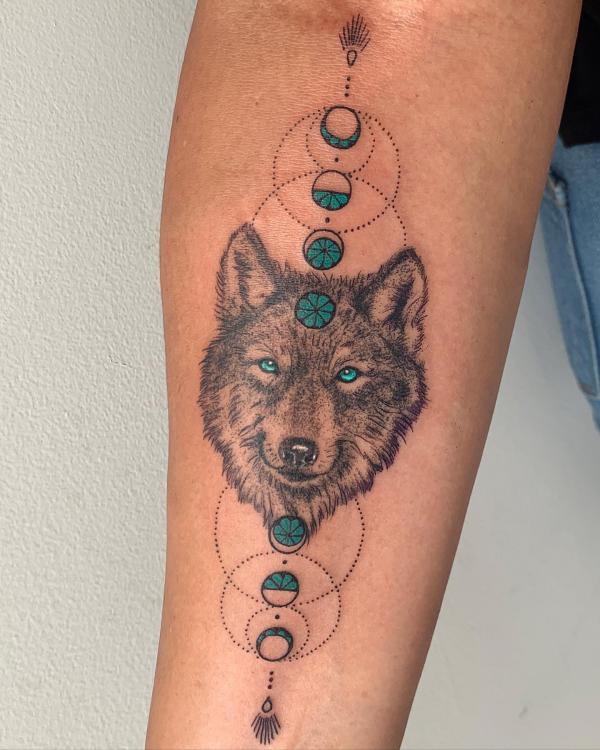 Moon phases with wolf tattoo
