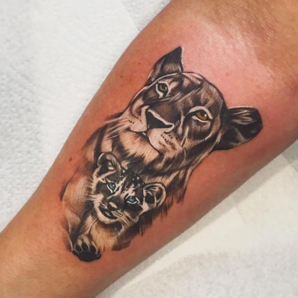 Mother and cub panther tattoo