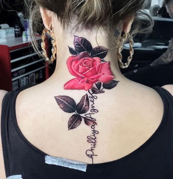 Neck rose tattoo with words