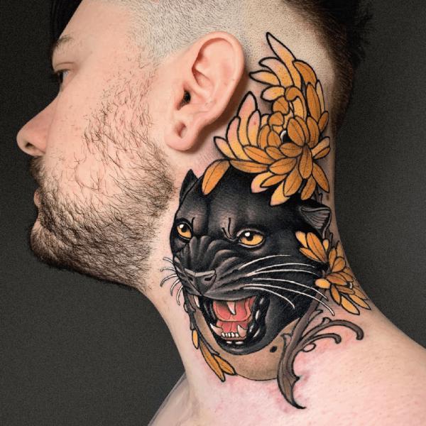 Neo traditional black panther with flower neck tattoo