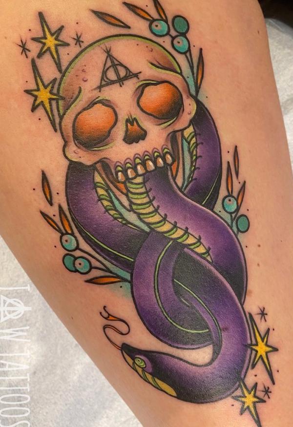 Neo traditional death eater with deathly hallows and stars thigh tattoo