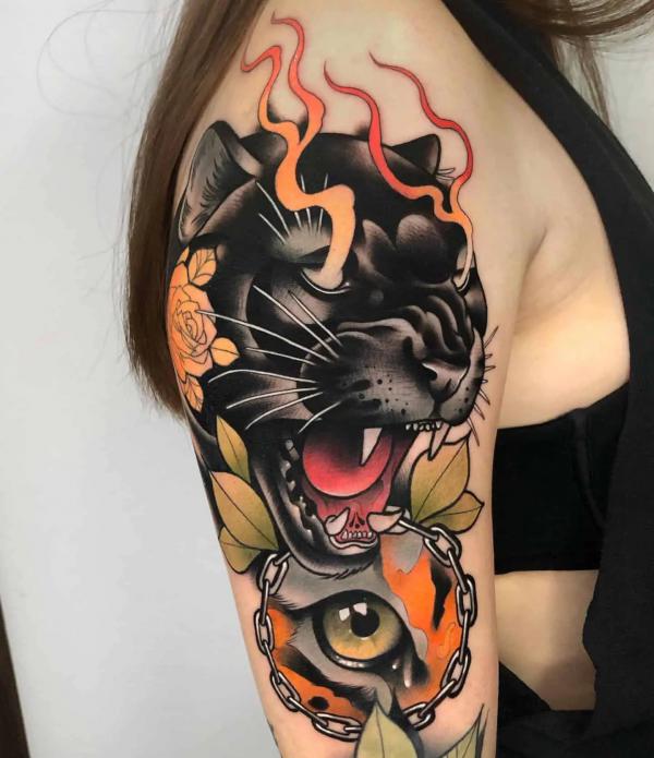 Neo traditional flaming panther with eye tattoo