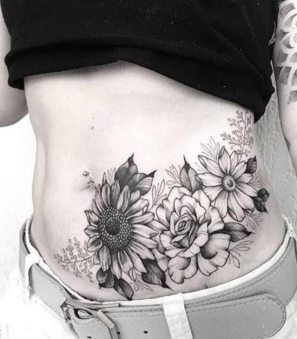 Peony daisy and sunflower tummy tattoo