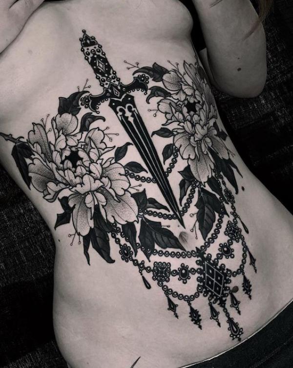 Peony flowers dagger and pearl necklace stomach tattoo