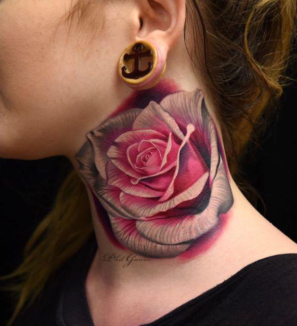 Pink and grey rose tattoo on neck