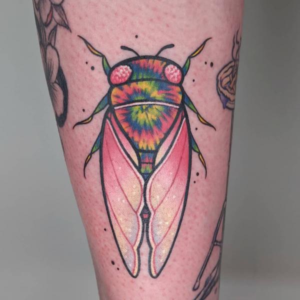 Pink cicada tattoo