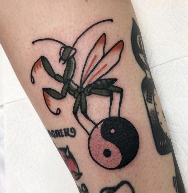 Praying mantis and Yin Yang tattoo traditional
