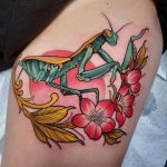 Praying mantis and flower with sun tattoo on thigh