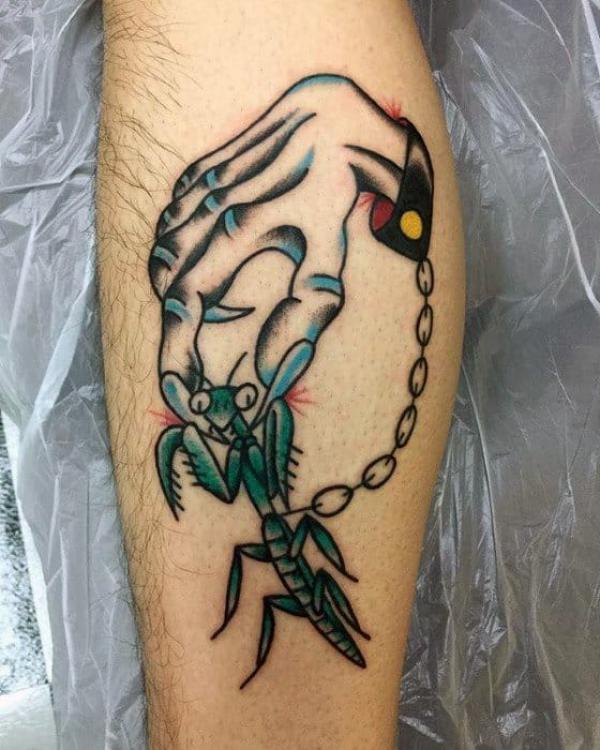Praying mantis and skeleton hand tattoo traditional