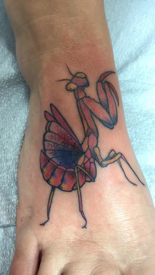 Praying mantis foot tattoo