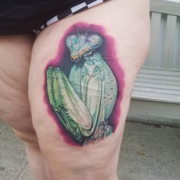 Praying mantis thigh tattoo
