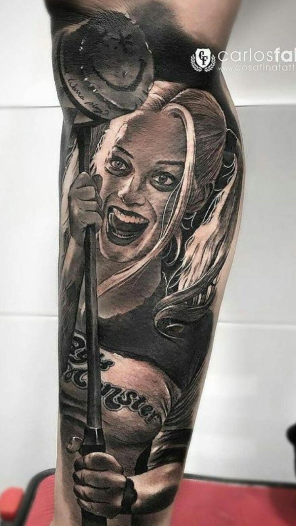 Realistic Harley Quinn holding Mallet lower leg tattoo