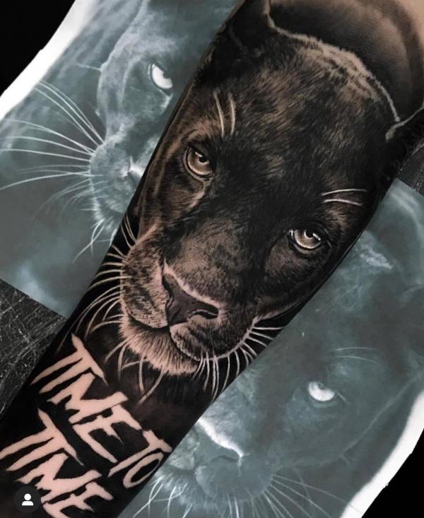 Realistic black panther tattoo with words Time to Time
