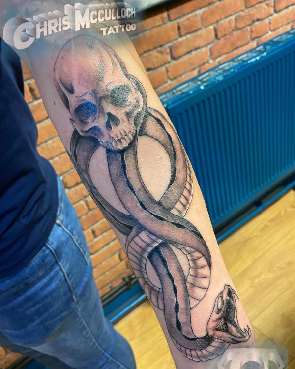 Realistic death eater tattoo sleeve