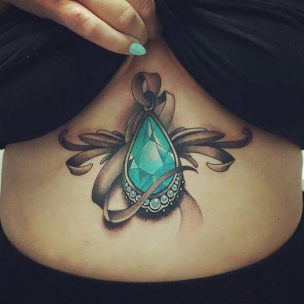 Realistic diamond stomach tattoo