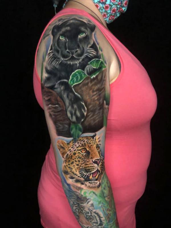 Realistic panther and jaguar tattoo sleeve
