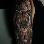Realistic prowling panther half sleeve tattoo