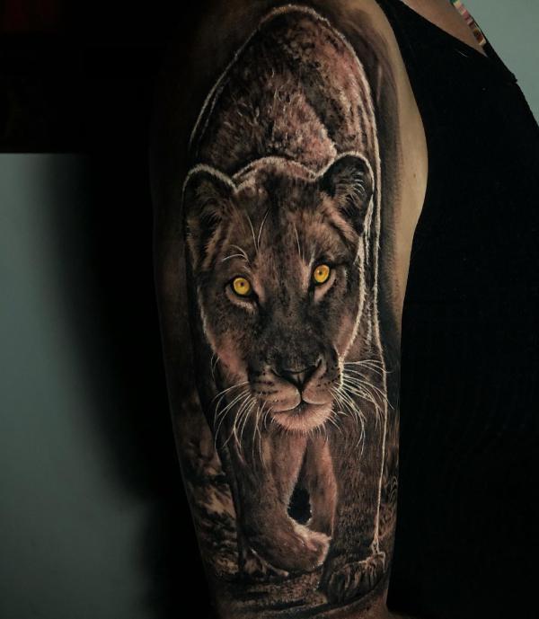 Realistic prowling panther half sleeve tattoo